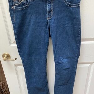 r women’s Lee mid rise solid blue jeans 12